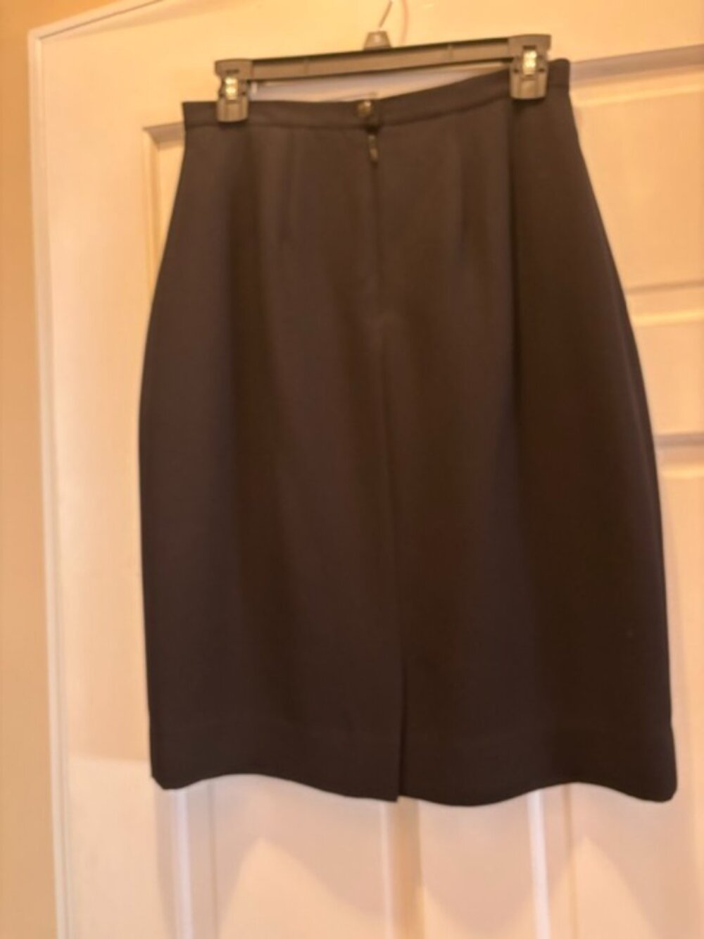 Black lined straight skirt.